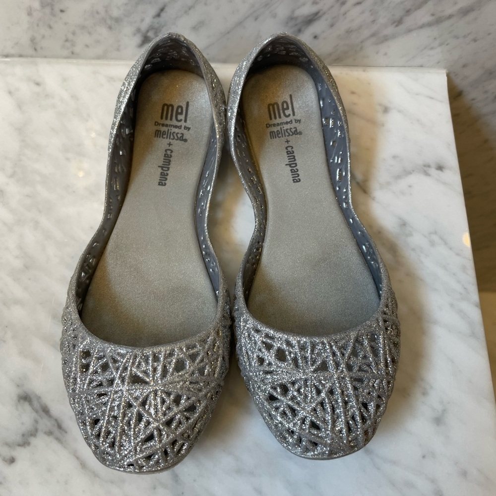 Girls silver Melissa ballet flats.